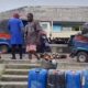 FRSC officers and residents gather after a cement-laden trailer crashed into a commercial tricycle, killing a keke driver in Yenagoa, Bayelsa State.
